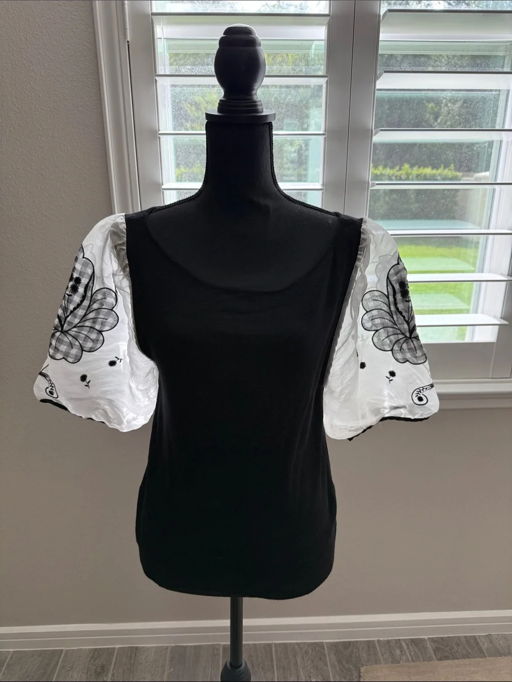 Anthropologie Black Top with White Embroidered Puff Sleeves